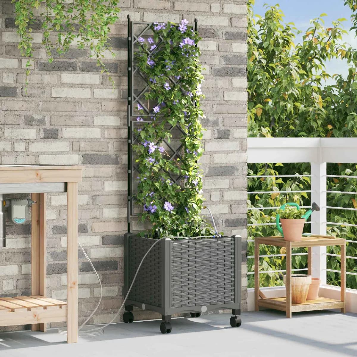 vidaXL Porte-plante de jardin avec irrigation et roues Gris clair PP